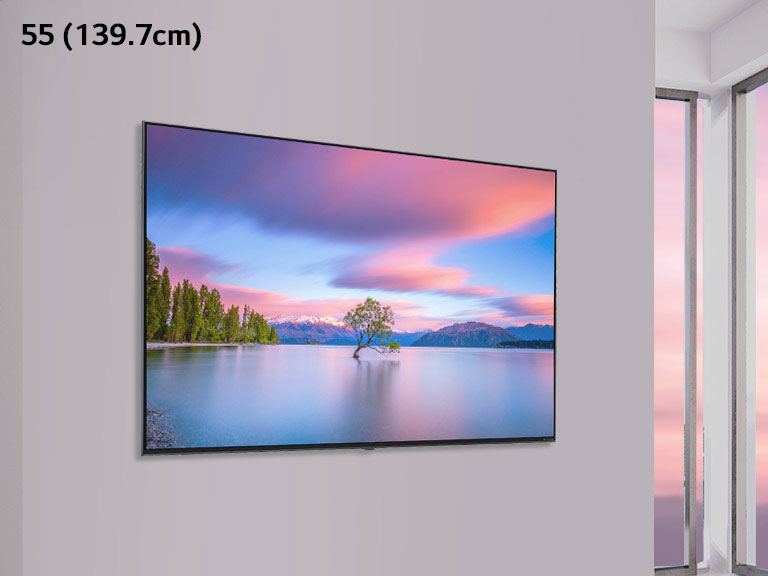 A scene depicting a flat-screen TV mounted on a white wall. As the image scrolls from side to side the image changes from a 55 (139.7cm) to 86 (218.44cm) TV.