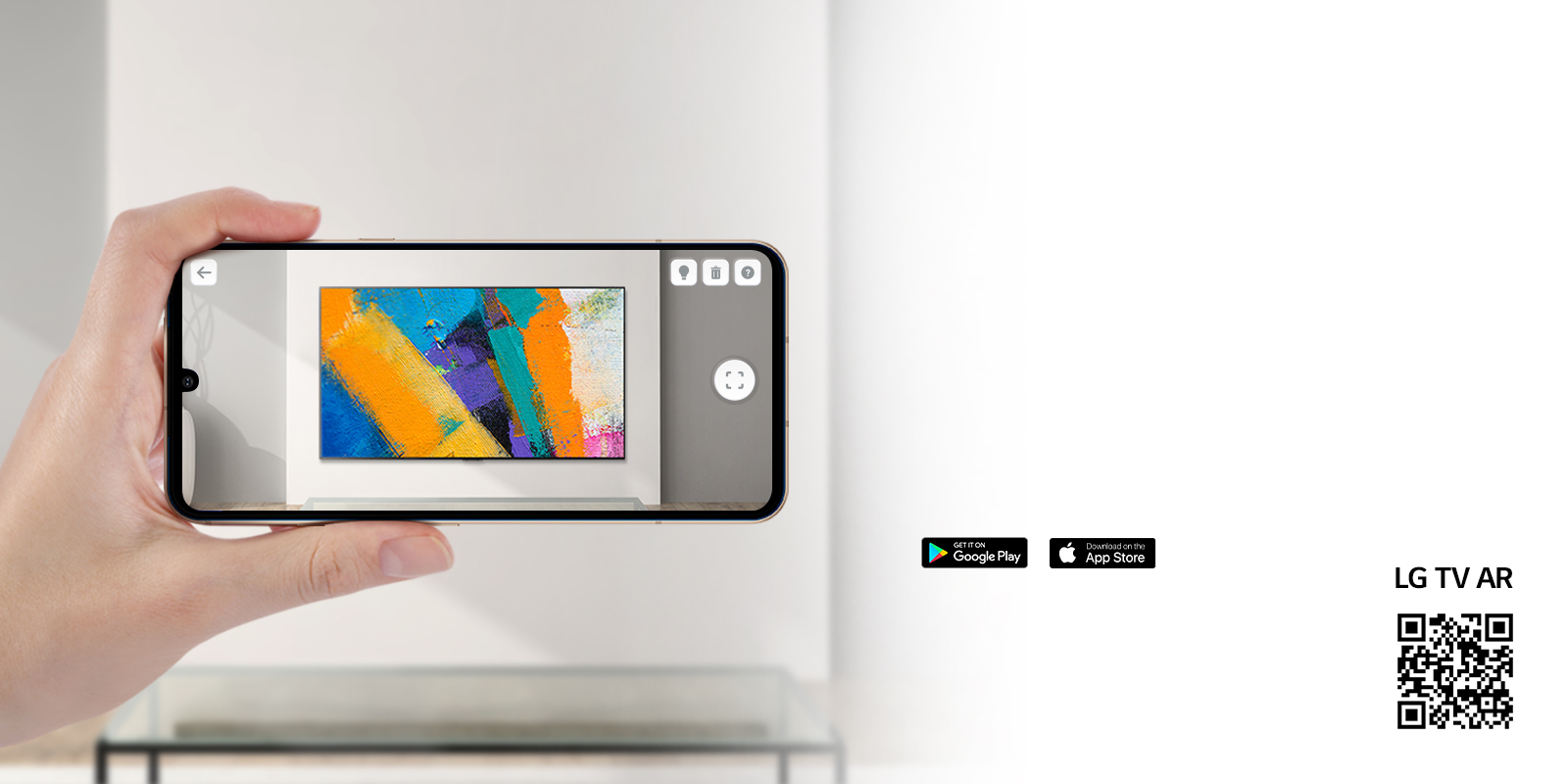 A person using LG TV AR app on a phone and a QR code which links to LG TV AR (http://www.lgtvism.com/lgtvar)