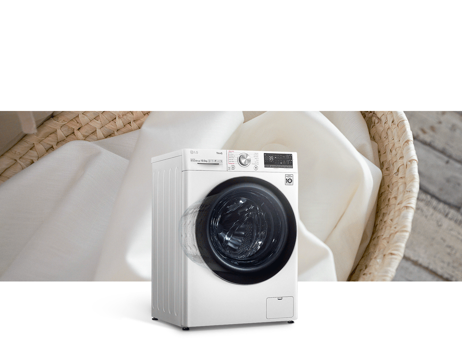 A washing machine, expressed as a large capacity, is in front of the laundry basket image.