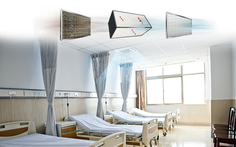 An image of air conditioner with three filters on the ceiling and a patient room with air conditioning on.