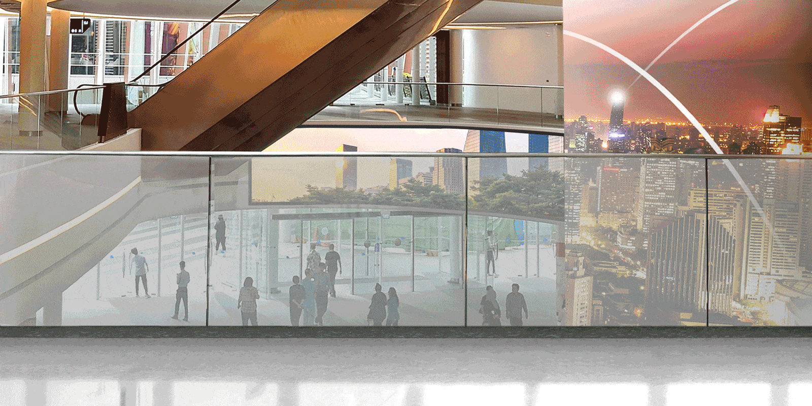 The 14mm LG Transparent LED film is installed in the shopping mall with reflecting the object behind the product even after the product is attached and turned off.