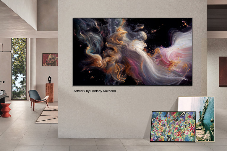 Interior of a sophisticated home. Lots of different artworks are displayed. On the center wall is an LG TV with popular artwork on the screen. The TV looks like a painting from a museum. 