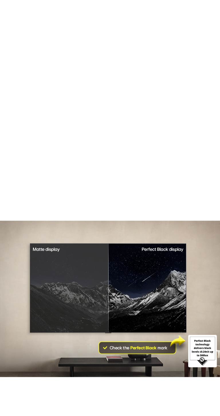 Living room space with a wall-mounted LG OLED TV. On the TV is a mountain range against a dark evening sky filled with stars. This scene is split in half. One side shows a duller, grayer version of the landscape labeled, Non Perfect Black display. On the other side is a more pleasing picture with a larger dynamic range of blacks and whites. This is labeled, Perfect Black display. Logo certification is also visible, Perfect Black Technology delivers black levels less than or equal to 0.24 nit up to 500 lux. A text bubble is by its side it says, check the Perfect Black certification mark. Then a colorful parrot in ultra-high definition is seen on the TV. Water drops are suspended in the air all around it. The image showcases Perfect Color as each different hue on the parrot's body is vibrant and vivid. The dark background with the detailed water splashes also highlights how the screen is reflection-free. Different logo certifications from UL and Intertek are visible. These refer to its 100% Color Fidelity, 100% Color Volume, and reflection-free claim. Text is also visible, check the Perfect Color certification mark.