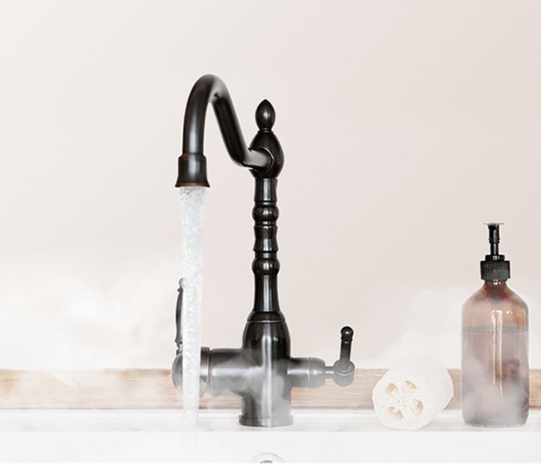 L’image d’une capitale où de l’eau chaude sort.