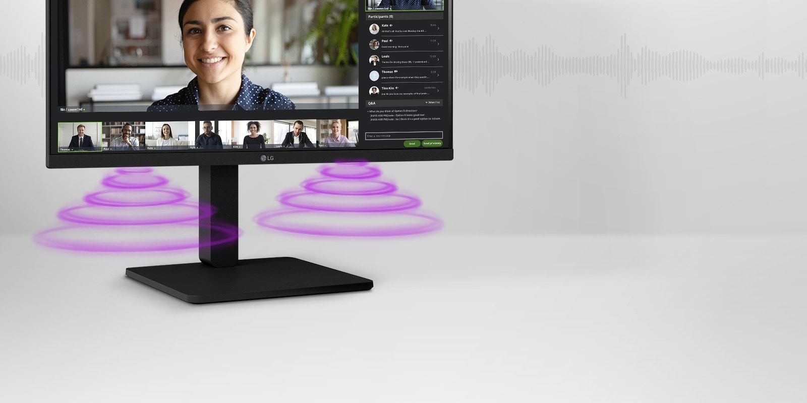 Vue latérale montrant une scène de vidéoconférence sur le moniteur.