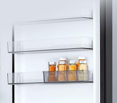 LG bottom freezer (GBBW726AEV) interior with transparent sliding mini door basket holding six small sauce bottles