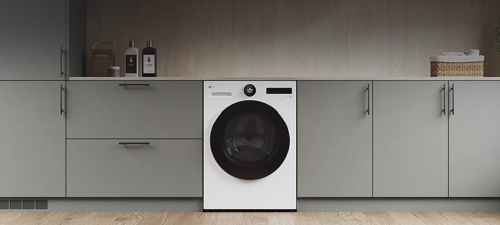 Zoom sur la machine à laver. L’écran change et le côté du panneau apparaît, montrant trois couleurs : blanc, gris clair et gris foncé.