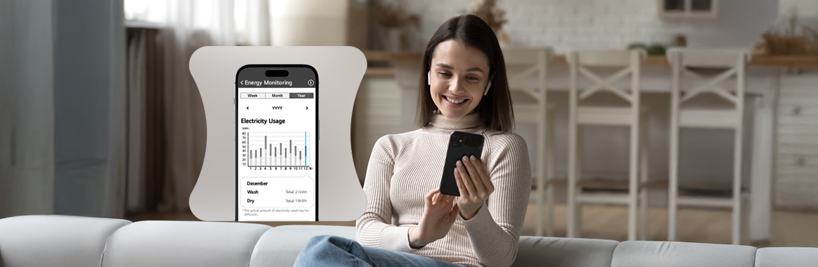 Une femme contrôle le sèche-linge LG à distance via une application ThinQ.