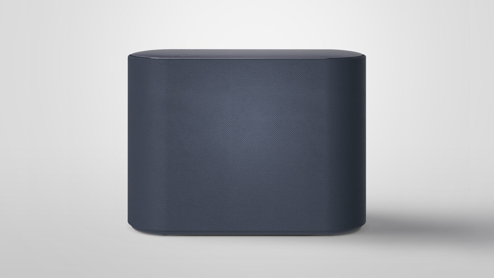 Un caisson de basses est placé sur un plancher blanc. La scène change pour zoomer sur deux composants à l’intérieur du caisson de basses qui vibrent légèrement avec des effets d’ondes sonores sortant des deux composants. Le texte indique que les vibrations sonores opposées des deux ports se minimisent mutuellement. La scène change pour effectuer un nouveau zoom arrière et montrer l’extérieur d’un caisson de basses.