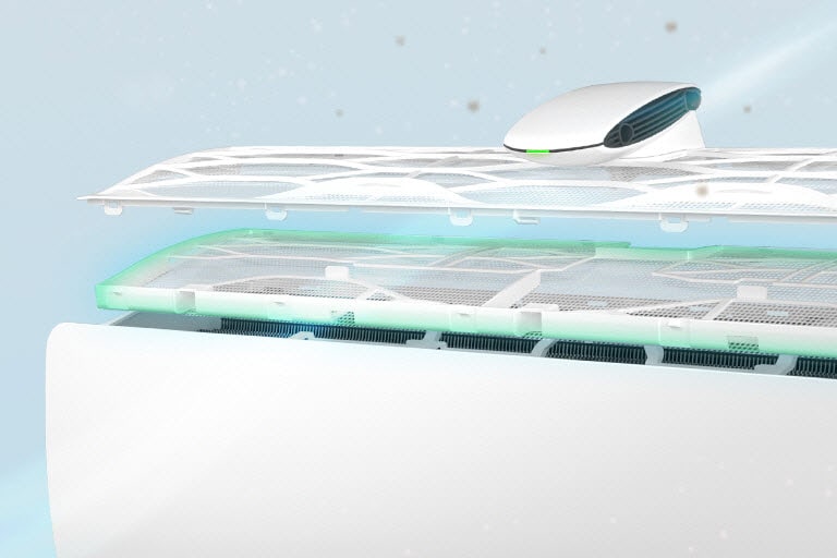 Une vue en angle latéral des filtres à poussière ultrafine mis en évidence par des lignes vertes. Le panneau supérieur de la machine flotte au-dessus avec les filtres déployés pour voir comment ils s’insèrent à l’intérieur.