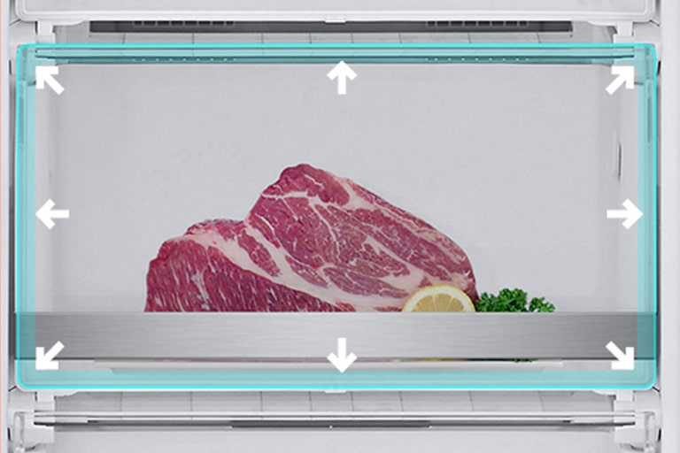 Gros plan sur une grande zone de congélation avec de gros morceaux de viande.