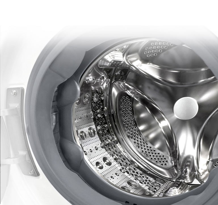 Image de l’intérieur de la machine à laver où l’on peut voir l’aubes en acier inoxydable.