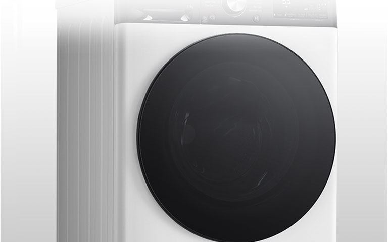 Image de la machine à laver avec la porte en verre trempé clairement visible.