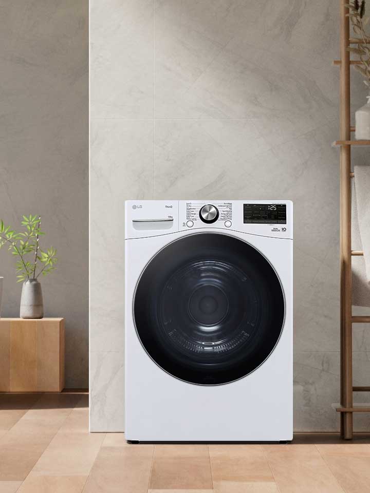 Vidéo suivant un gros plan sur le sèche-linge LG dans la buanderie avec une machine à laver