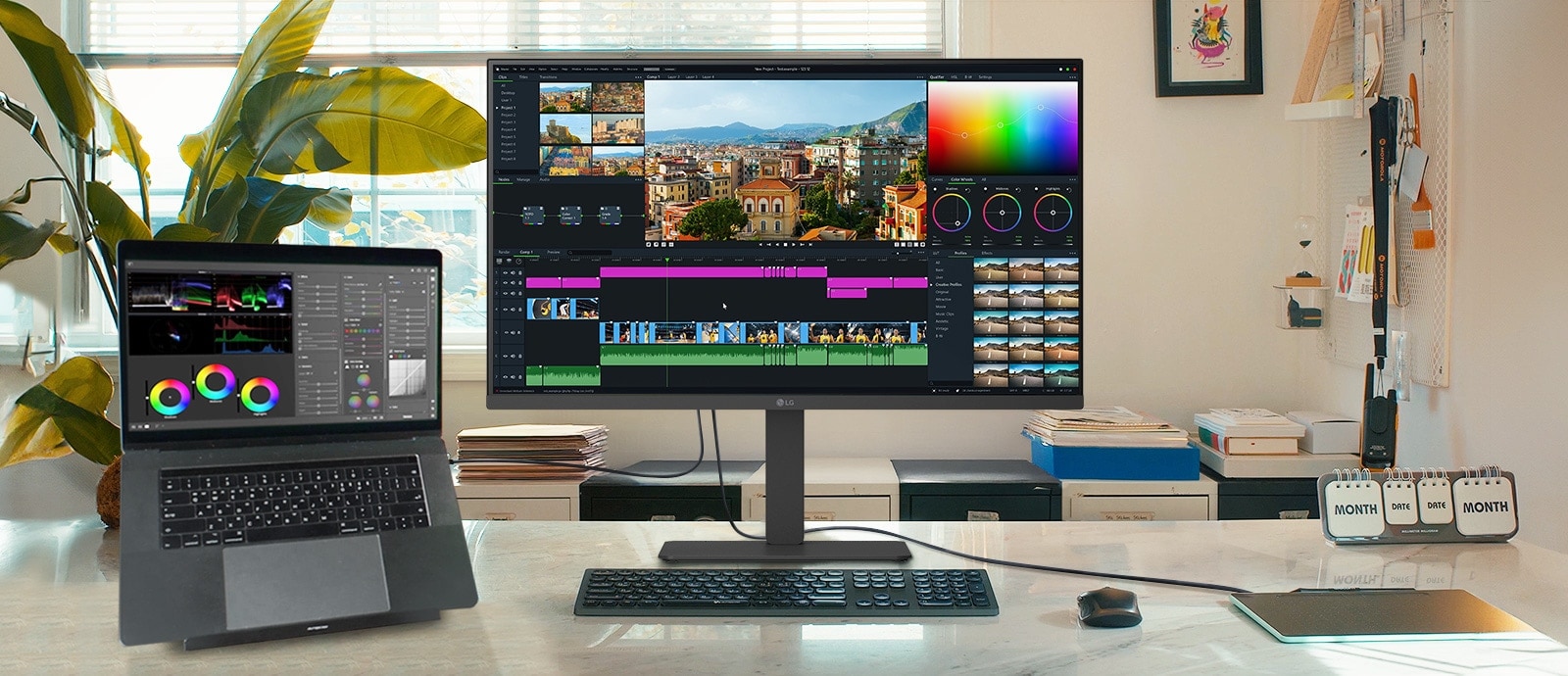 Un espace de travail créatif avec un moniteur LG connecté à un ordinateur portable. Tous deux affichent une interface de montage vidéo avec des outils de correction de couleurs et une timeline.