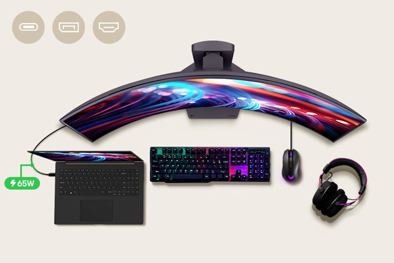 Un moniteur pour jeu de 39 pouces est positionné au centre du bureau entouré de plusieurs périphériques informatiques.	