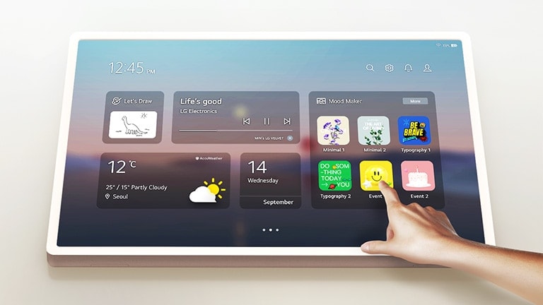 StanbyME 2 with touchscreen in use by a person.