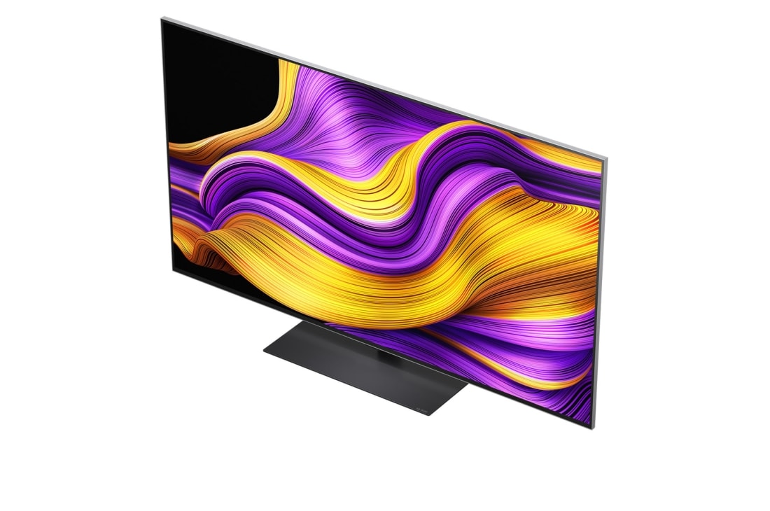 LG Smart TV LG OLED evo AI 4K G5 2025 55 pouces, Le processeur alpha 11 AI de 2ème génération sur un fond sombre. Il brille de l’intérieur d’une lumière violette et bleue, illuminant les circuits de micropuce qui l’entourent. Le titre parle de la fa, OLED55G56LS, thumbnail 6