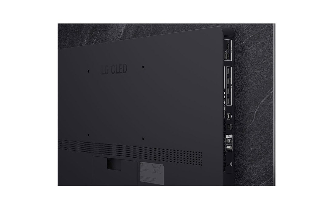 LG Smart TV LG OLED evo AI 4K C5 2025 55 pouces, Perroquet coloré en ultra haute définition sur un fond noir. On voit des gouttes d’eau suspendues dans l’air tout autour. L’image présente la technologie Perfect Color, car chaque couleur différente d, OLED55C54LA, thumbnail 9