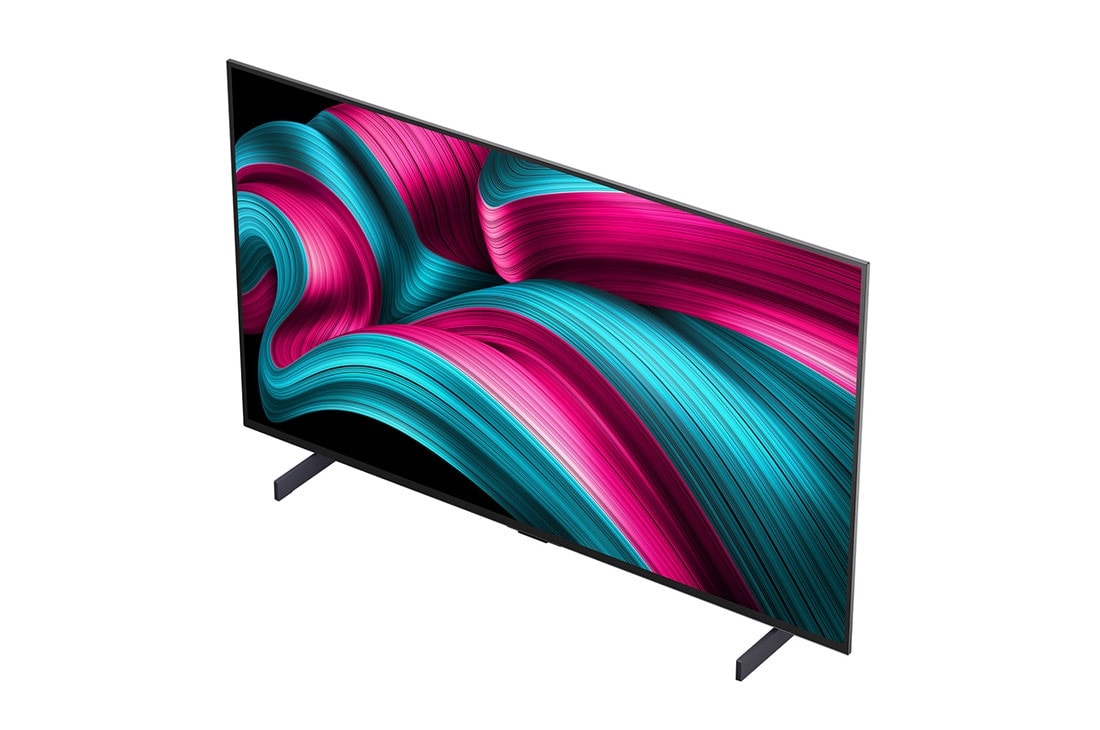 LG Smart TV LG OLED evo AI 4K C5 2025 42 pouces, Feu de camp la nuit en plein milieu de la nature. Au loin se trouve une forêt et un lac. Le ciel nocturne est rempli d’étoiles. Toute la scène est divisée en deux. Un côté est plus sombre et plus tern, OLED42C54LA, thumbnail 6