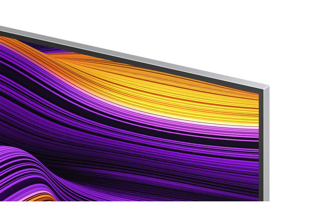 LG Smart TV LG OLED evo AI 4K G5 2025 65 pouces, Espace salon avec une LG OLED TV à fixation murale. Sur la TV se trouve une chaîne de montagnes face à un ciel sombre et nocturne rempli d’étoiles. Cette scène est divisée en deux pour montrer comment, OLED65G56LS, thumbnail 8