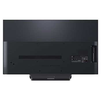 LG Smart TV LG OLED evo AI 4K G5 2025 48 pouces, Espace salon avec une LG OLED TV à fixation murale. Sur la TV se trouve une chaîne de montagnes face à un ciel sombre et nocturne rempli d’étoiles. Cette scène est divisée en deux pour montrer comment, OLED48G56LS, thumbnail 8