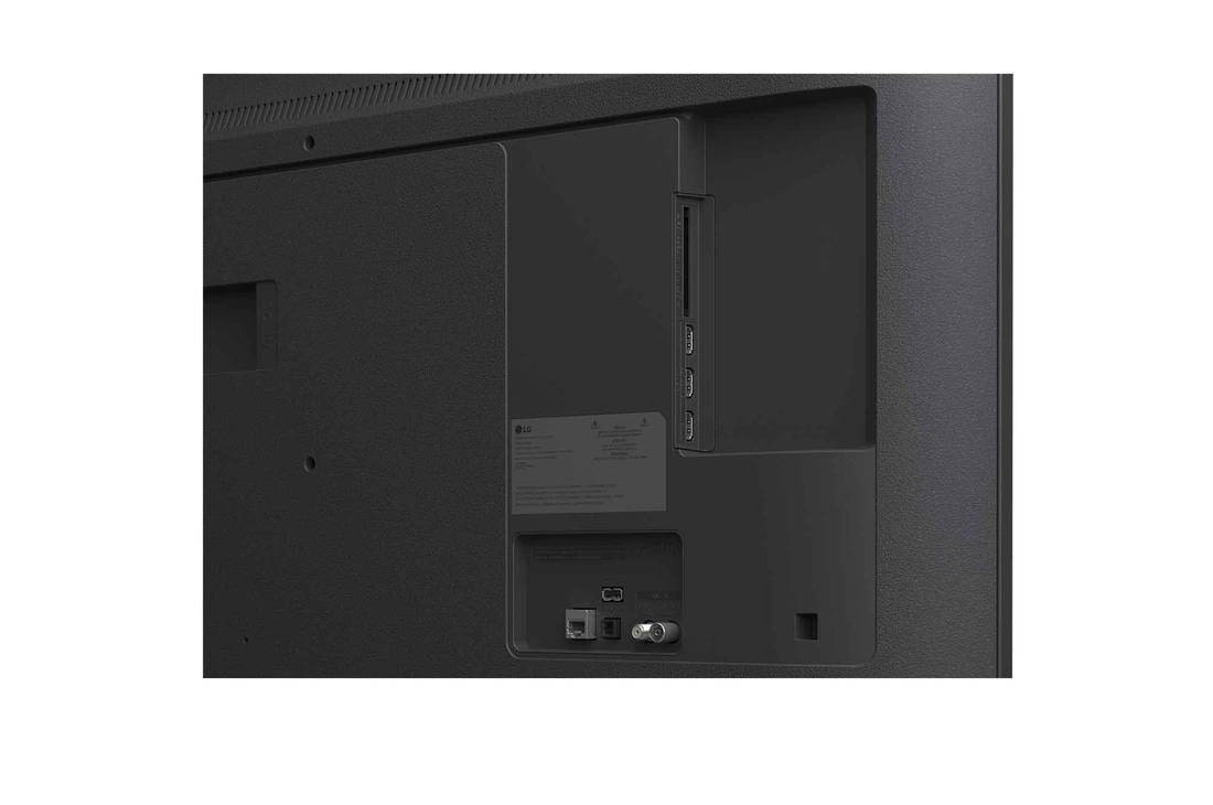 LG Smart TV LG UHD AI UA75 4K 2025 50 pouces, Écran LG TV avec une télécommande AI Magic Remote au premier plan. Le bouton IA est mis en surbrillance et une bulle de dialogue montre du texte : suggérez un film que j’aime. À l’écran, nous voyons l, 50UA75006LA, thumbnail 10