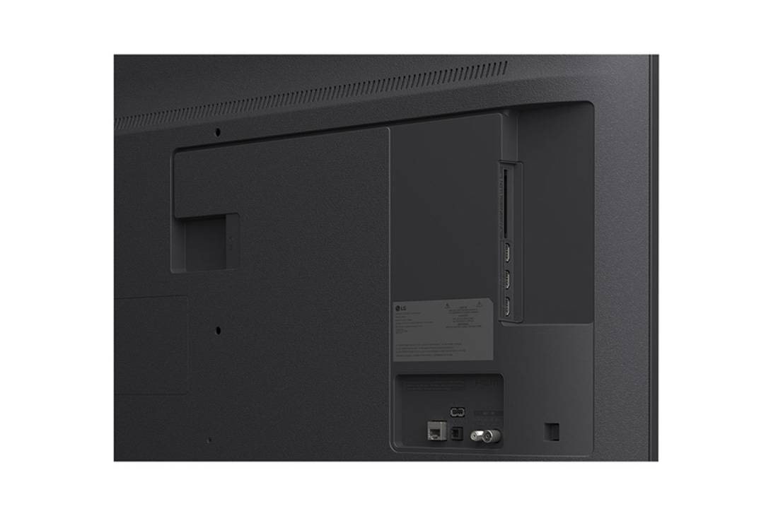 LG Smart TV LG UHD AI UA75 4K 2025 55 pouces, LG TV avec un écran d’une taille impressionnante fixé sur un mur au-dessus d’une LG Soundbar dans un salon au style moderne., 55UA75006LA, thumbnail 9