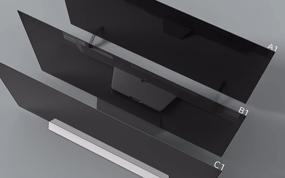 Three entry OLED TV models are arranged against a grey background.