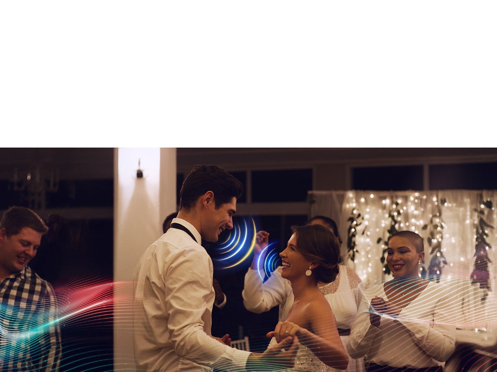LG OLED AI B6 with AI Object Remastering Pro shows a couple dancing at a lively indoor party, enhancing voices and key sounds amid surrounding music and crowd noise for clearer, more immersive audio.