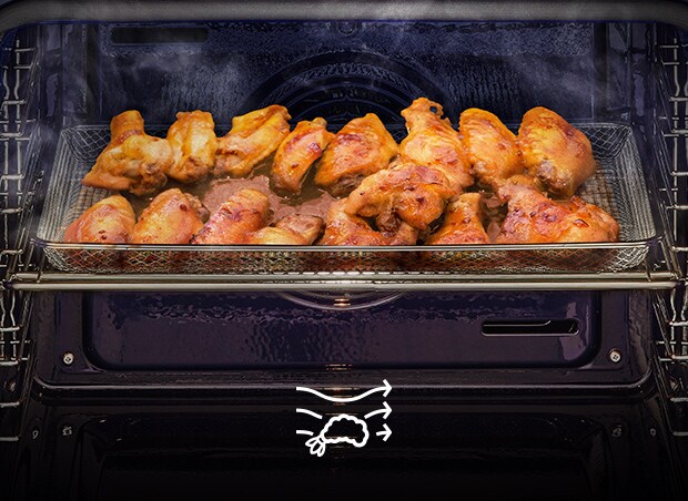 Пилешки крилца, приготвени с функцията Air Fry във фурната за вграждане LG.