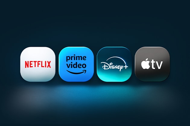 Los logo de las aplicaciones Netflix, Prime Video, Disney+ y Apple TV están uno al lado del otro frente a un fondo azul. 