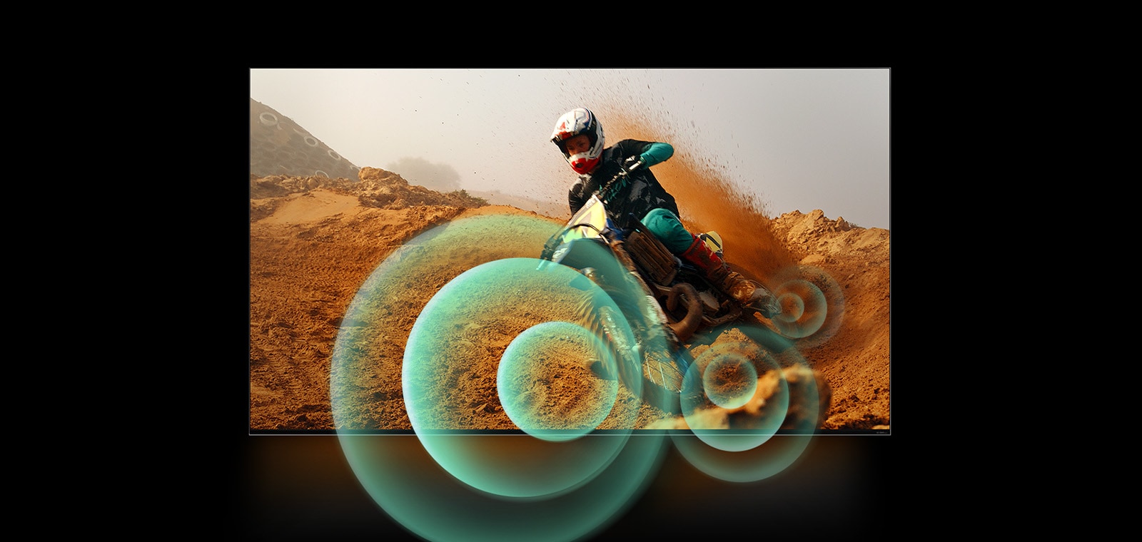 A man riding a motorbike on a dirt track with bright circle graphics around the motorbike.