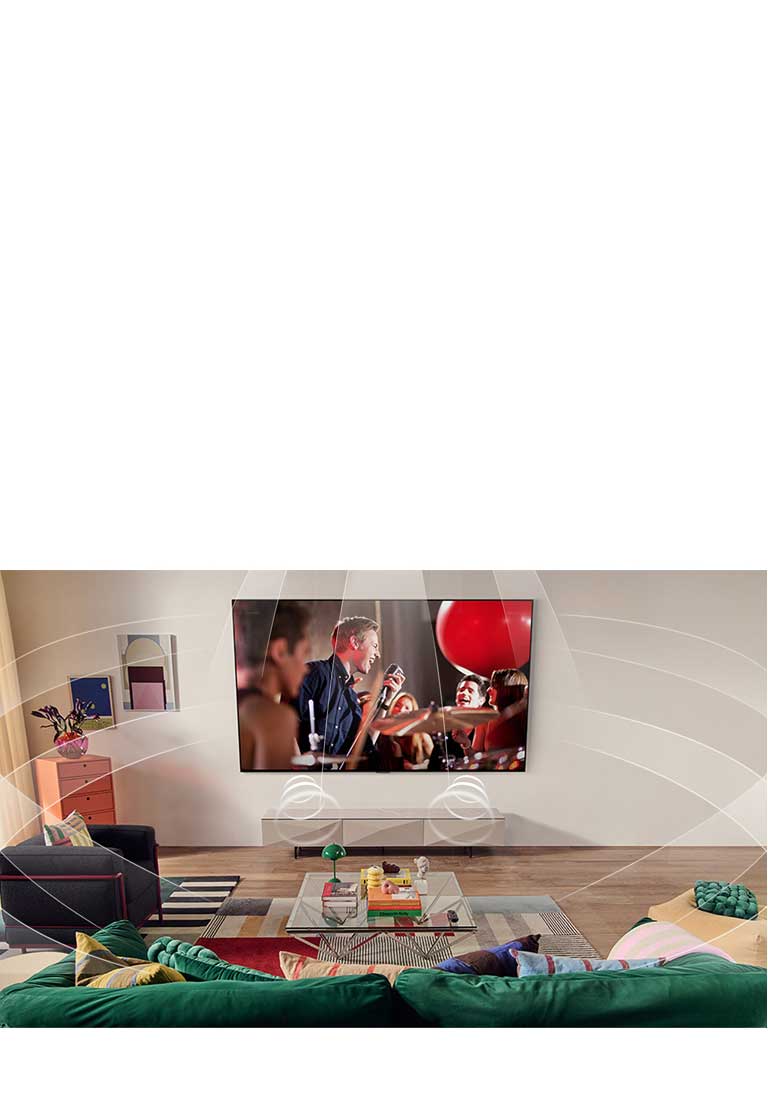 Una sala de estar con un LG TV Wall Mounted. Representación gráfica de las ondas de sonido para llenar el espacio que muestra cómo los canales virtuales 9.1.2 crean una experiencia de sonido envolvente para el usuario. 