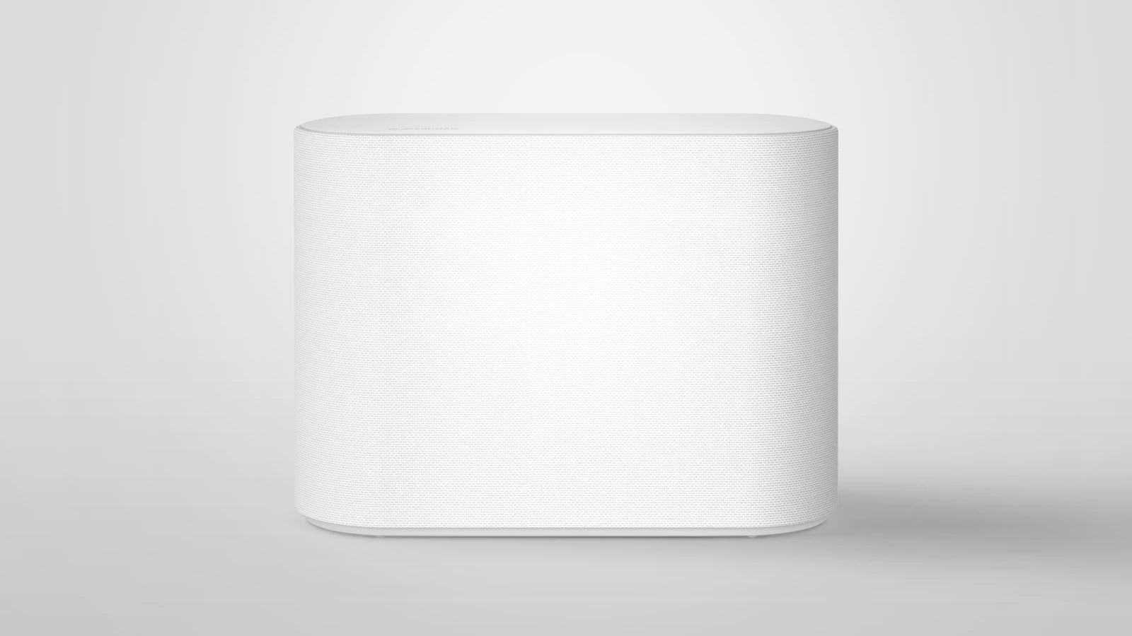 Un subwoofer se coloca sobre un piso blanco. La escena cambia para enfocar dos componentes dentro del subwoofer que están vibrando levemente y efectos de ondas de sonido que salen de los dos componentes. La escena cambia para alejarse una vez más y mostrar el exterior de un subwoofer.