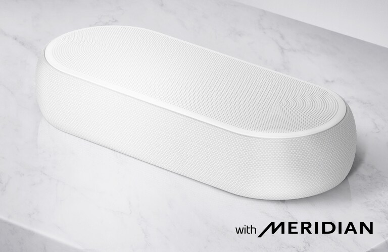 Primer plano del lado derecho de la barra de sonido LG con el logotipo de LG en la esquina inferior derecha de un producto.