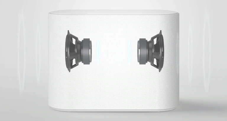 Un subwoofer se coloca sobre un piso blanco. Se muestran dos componentes dentro del subwoofer.