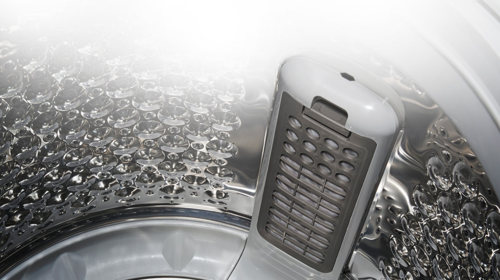 Filtro atrapa pelusas más ancho, mantiene la tina y tu ropa más limpia