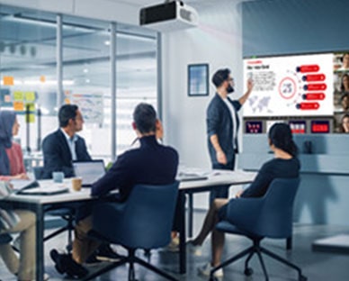Escenas del uso de LG ProBeam en empresas.