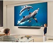 LG 65'' LG QNED AI 4K Smart TV colores más reales – Incluye Magic Remote AI, Close-up of an LG TV screen showing how AI Search works. A small chat window is open showing how the user asked for what sports games are available. AI search responded via chat and by showing thumbna, 65QNED70ASA, thumbnail 13