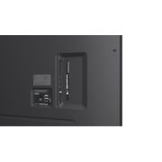 LG 75'' LG QNED73 AI 4K Smart TV, A family sits on a couch facing a LG QNED TV mounted on a wall above a LG Soundbar with a little girl pointing to a screen depicting two dolphins. The title talks about how every action is more thrill, 75QNED73ASC, thumbnail 13