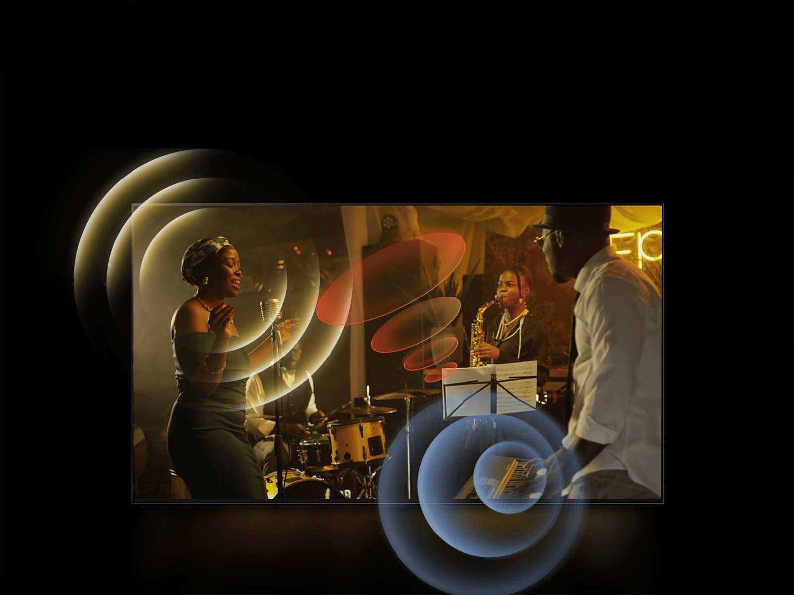 Ein LG OLED TV zeigt einen Musiker bei einem Auftritt, mit hellen Kreisgrafiken um die Mikrofone und Instrumente.