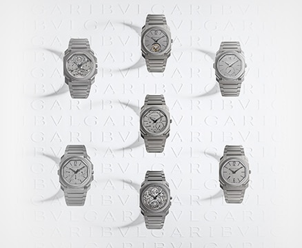 Six montres BVLGARI en argent placées en cercle, avec une septième au milieu.