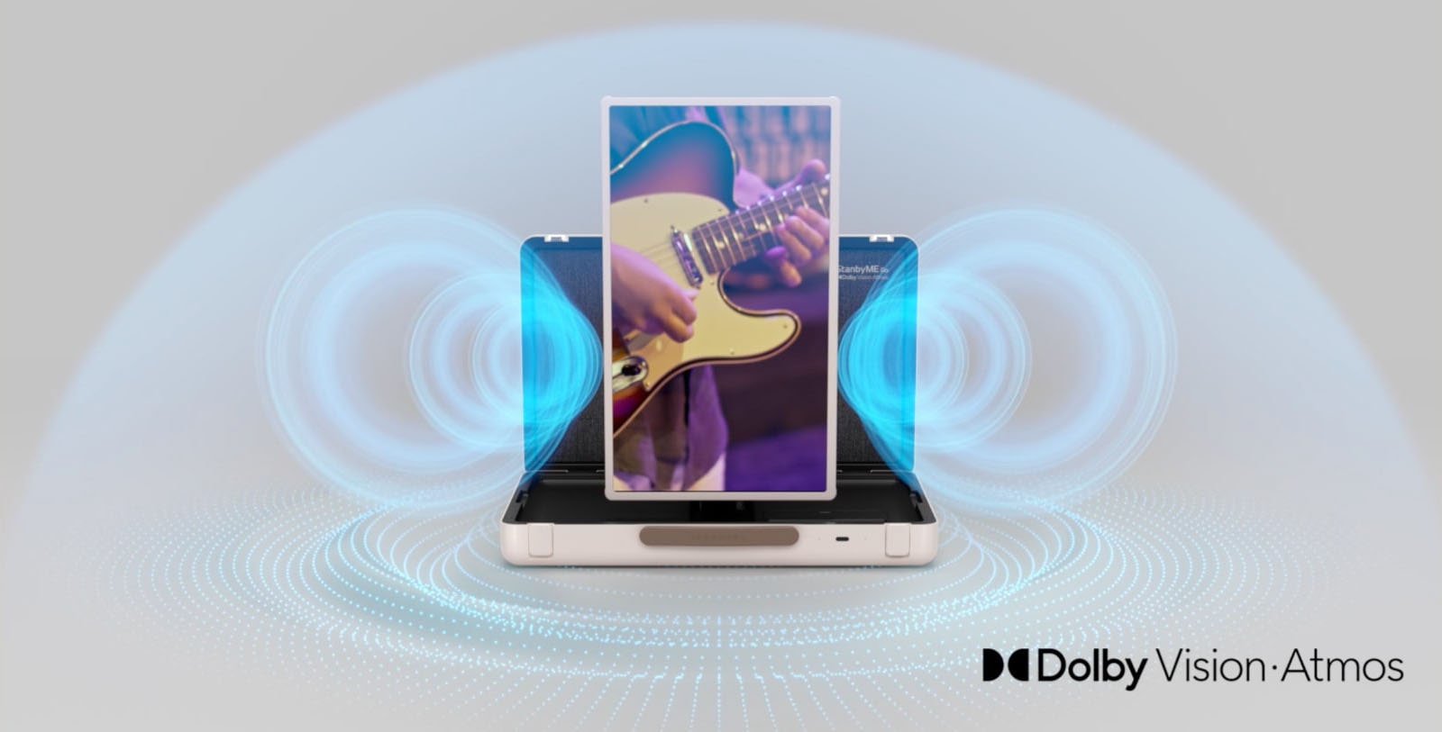 An animated clip of LG StanbyME Go shows a guitar-playing scene. In the beginning, the screen is set on table mode, and the sound graphics are coming directly out from the speaker. As the screen rise up horizontally, the sound graphics appear on both sides of the screen. As the screen is set on a vertical mode, the sound graphics are coming out from the speaker. And the sound dome covers the product, and the soundwave graphic keeps moving while the screen orientation varies.