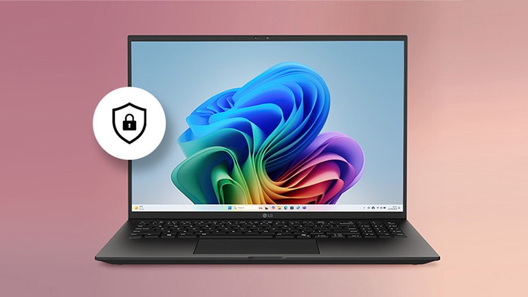 这张图片中，一台笔记本电脑的屏幕显示着多彩的 Windows 壁纸，旁边带有一个安全盾牌图标，突显设备内置了硬件级的防护功能。