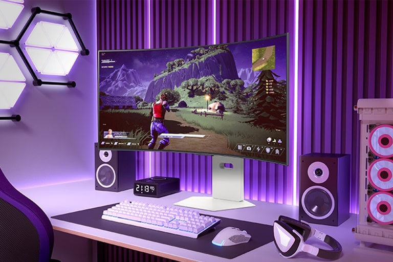 Curved gaming monitor displaying an action-adventure game in a vibrant gaming setup with purple lighting and a PC tower nearby.