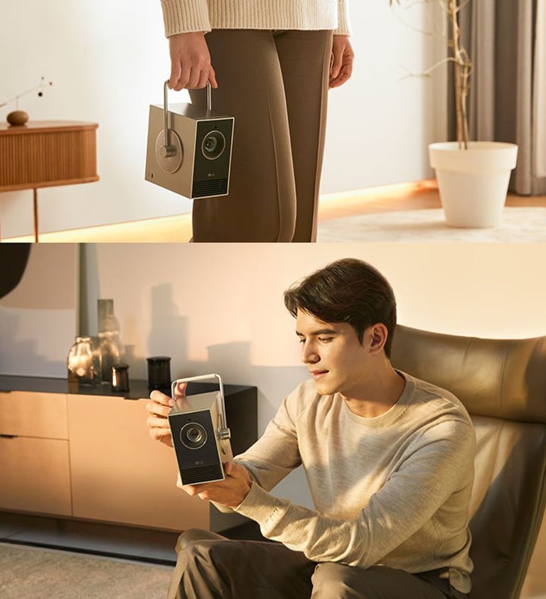 LG CineBeam HU710PB的多种使用场景 - 拿起和移动产品，操作产品。