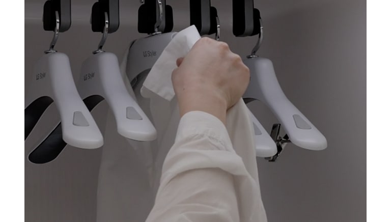 悬挂衣物后开启快速净味模式