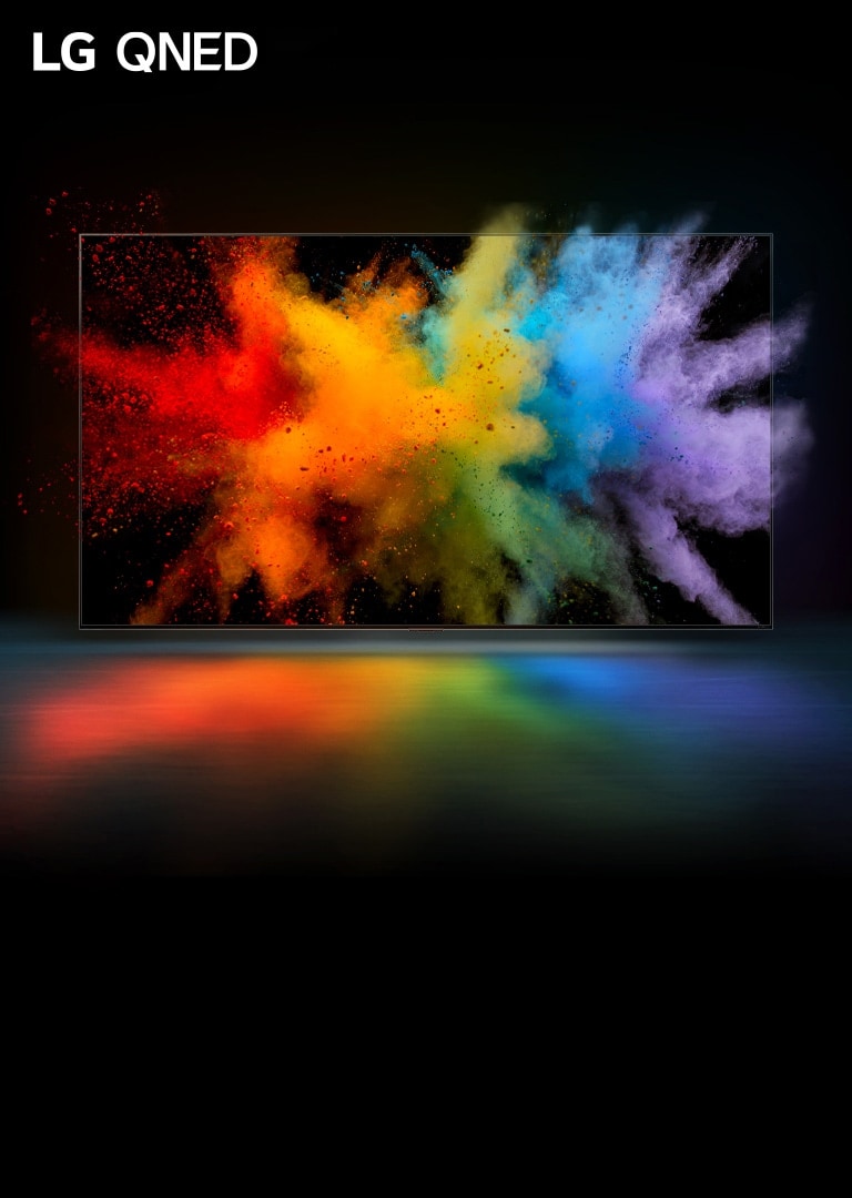 电视放置在黑色空间中。电视显示屏中彩色粉末爆炸开来。