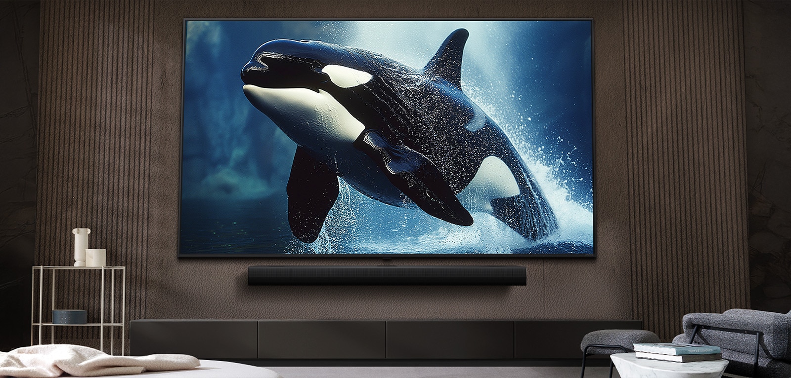 在现代风格的客厅里，超大屏幕的 LG TV 安装在墙上，位于 LG Soundbar 上方。